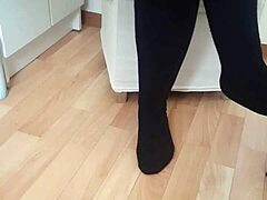 Candid video of girlfriend's sister in socks giving a footjob