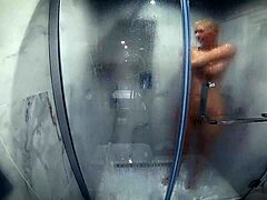 Secret camera captures skinny European milf taking a shower
