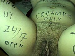 MILF hotwife with big boobs gets covered in body writing by her husband before a group gangbang