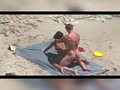 African couple enjoys public beach sex
