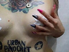 Fetish fun with Dominatrix Nika's natural boobs and tattoo fetish