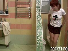 Teen roommate caught pleasuring herself in the bathroom