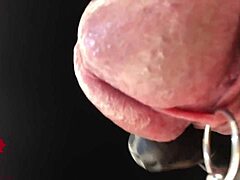 Intense POV of latex-clad amateur indulging in peehole play and satisfying climax